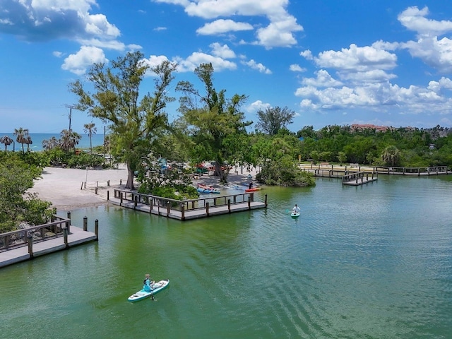 6512 Midnight Pass Rd Unit 504, Sarasota, FL 34242 - dock area with a water view