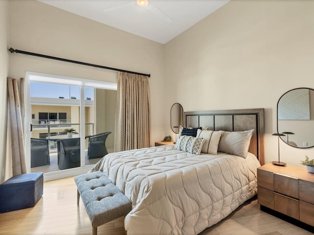 6512 Midnight Pass Rd Unit 504, Sarasota, FL 34242 - bedroom with light wood-type flooring and lofted ceiling