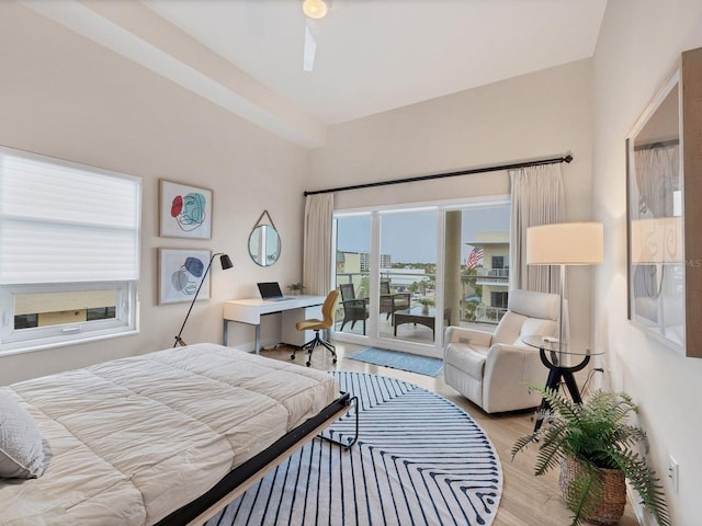 6512 Midnight Pass Rd Unit 504, Sarasota, FL 34242 - bedroom with access to outside and wood finished floors