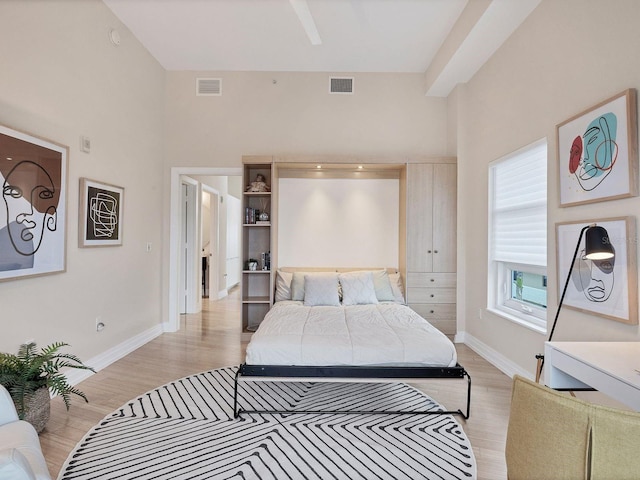 6512 Midnight Pass Rd Unit 504, Sarasota, FL 34242 - bedroom featuring light wood-style floors and baseboards