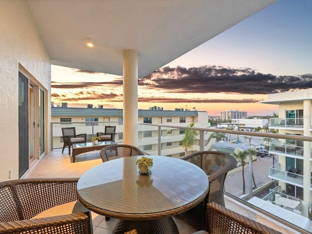 6512 Midnight Pass Rd Unit 504, Sarasota, FL 34242 - balcony at dusk with a view of city
