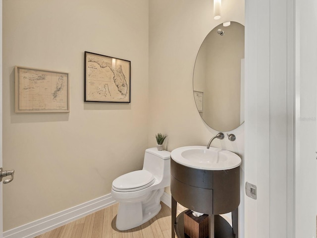 6512 Midnight Pass Rd Unit 504, Sarasota, FL 34242 - bathroom with wood finished floors and vanity
