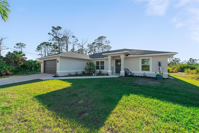 view of front facade featuring a front yard, an attached garage, driveway, and stucco siding