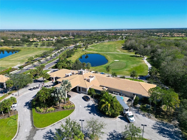 aerial view featuring view of golf course and a water view