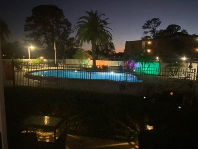 view of pool with fence and a fenced in pool