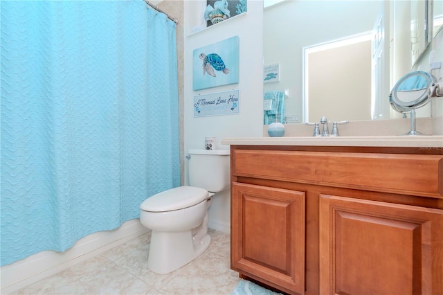 full bathroom with shower / bath combo with shower curtain, toilet, vanity, and tile patterned flooring