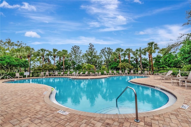 pool with a patio area