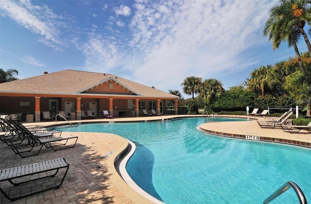 community pool featuring a patio