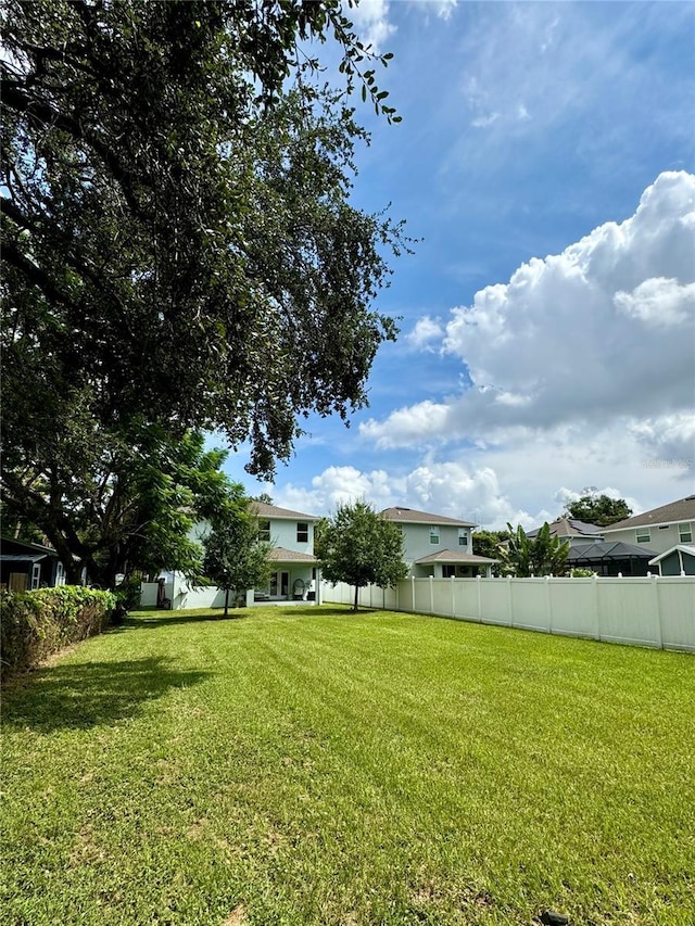 view of yard with fence