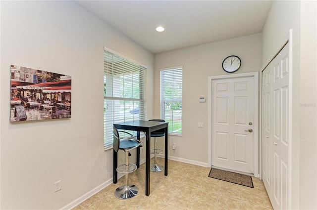 foyer entrance with baseboards