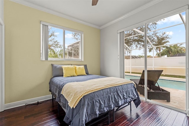 bedroom with ornamental molding, a ceiling fan, wood finished floors, access to outside, and baseboards