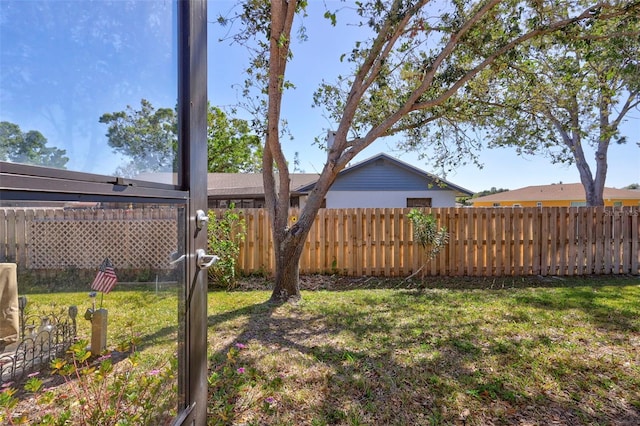 view of yard featuring fence