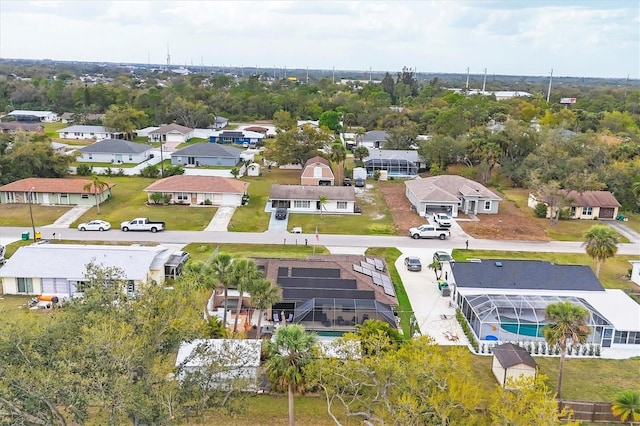 birds eye view of property with a residential view