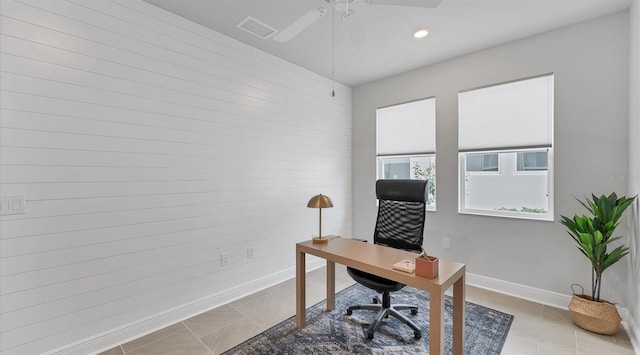 office space featuring recessed lighting, visible vents, baseboards, and tile patterned flooring