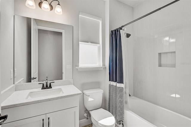 full bathroom featuring vanity, shower / bath combination with curtain, and toilet