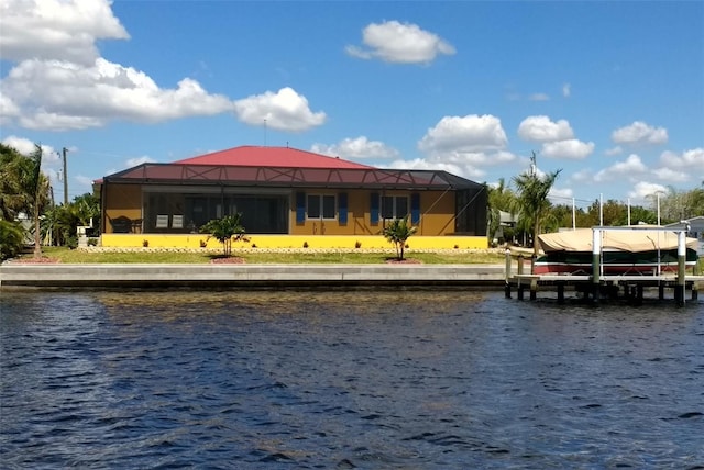 exterior space featuring a boat dock and boat lift