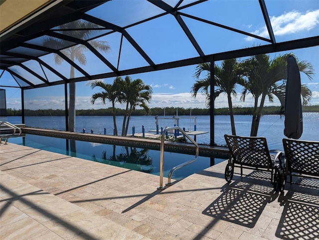 exterior space with glass enclosure, boat lift, a water view, an outdoor pool, and a patio area