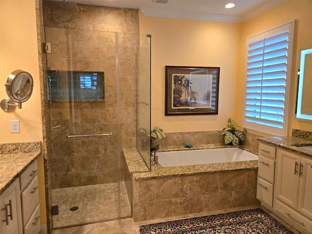 full bath with a stall shower, visible vents, a garden tub, crown molding, and vanity