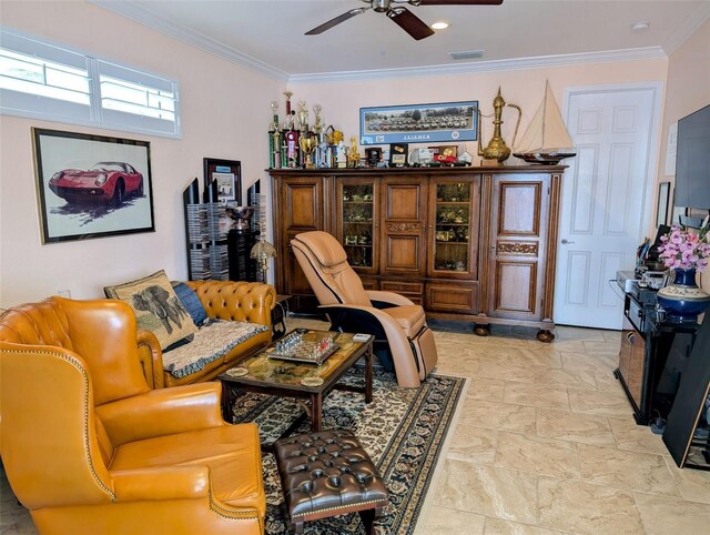 living area with visible vents, crown molding, and ceiling fan