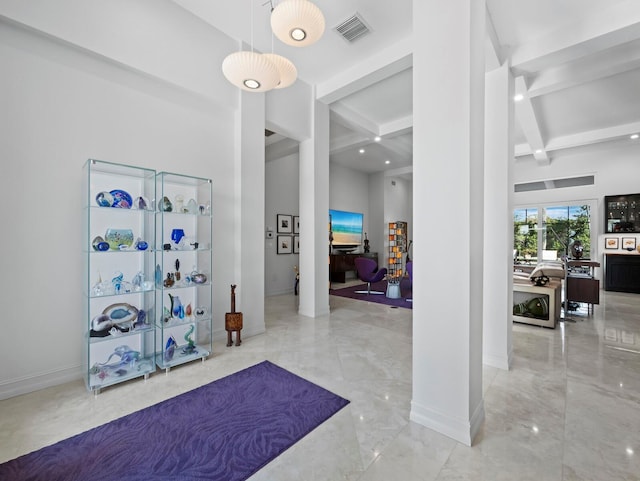 entryway featuring baseboards, visible vents, marble finish floor, beam ceiling, and recessed lighting