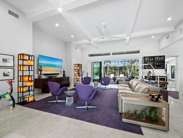 living area featuring a towering ceiling, visible vents, beam ceiling, and recessed lighting