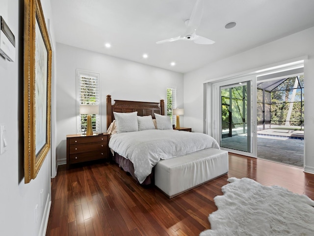 bedroom with access to exterior, recessed lighting, multiple windows, and hardwood / wood-style flooring