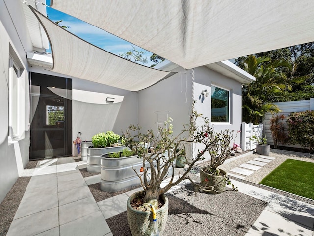 view of patio / terrace with fence