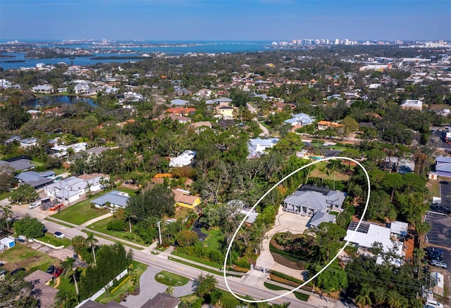 aerial view featuring a water view and a residential view