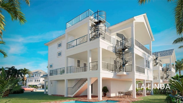 rear view of property featuring a patio area and stucco siding