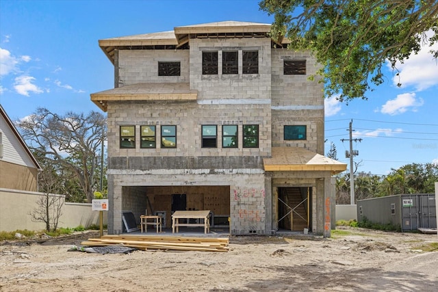 back of house featuring fence