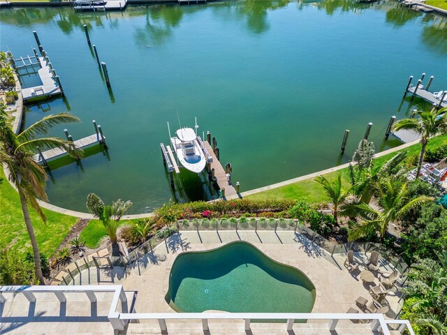 view of dock featuring a patio area, a water view, and boat lift