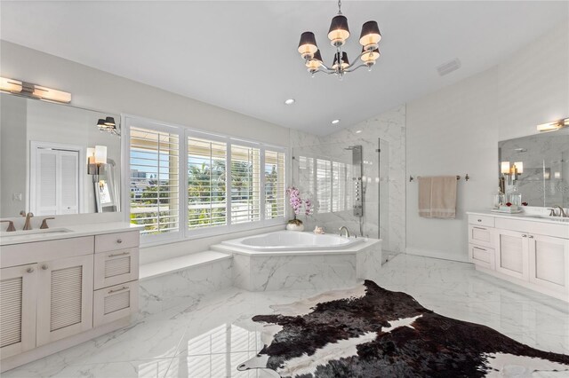 full bathroom with a sink, a marble finish shower, a garden tub, and marble finish floor