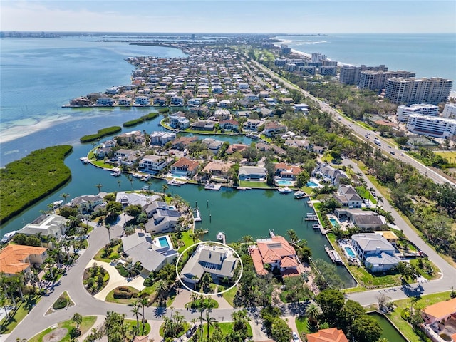 aerial view with a residential view and a water view