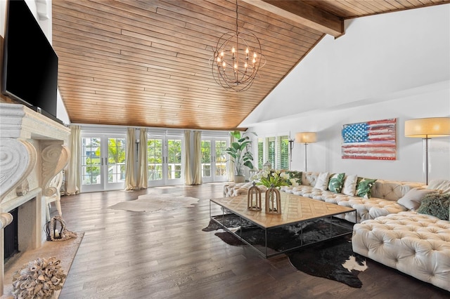 520 Harbor Cay Dr, Longboat Key, FL 34228 - living area with high vaulted ceiling, wood ceiling with exposed beams, plenty of natural light, a chandelier, and a premium fireplace