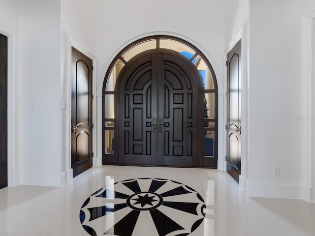 entrance foyer featuring baseboards