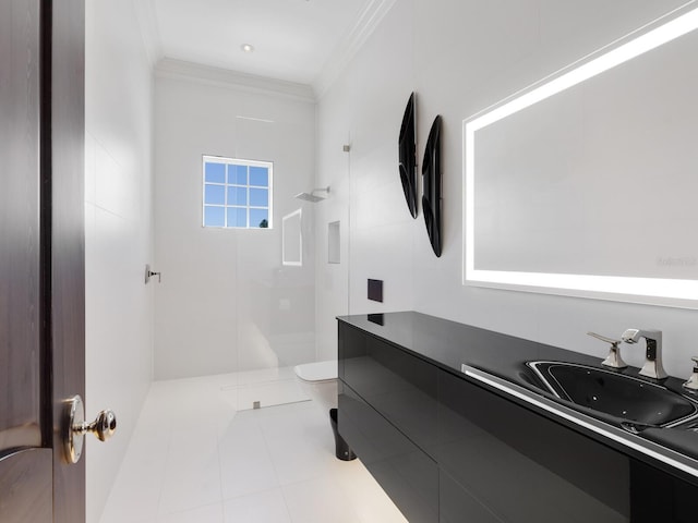 bathroom with vanity, a walk in shower, crown molding, toilet, and tile patterned floors