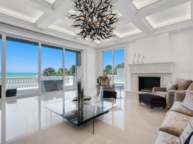 living area featuring a high end fireplace, a water view, ornamental molding, beam ceiling, and coffered ceiling