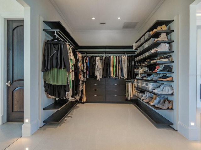 spacious closet featuring visible vents