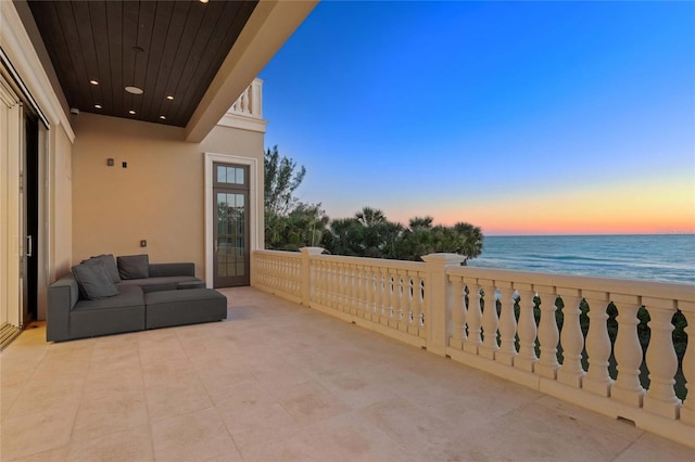3909 Casey Key Rd, Nokomis, FL 34275 - view of patio featuring a water view and a balcony