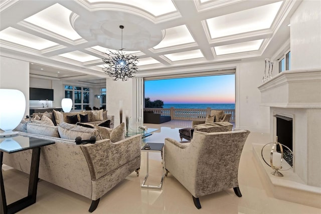 3909 Casey Key Rd, Nokomis, FL 34275 - living room featuring coffered ceiling, a chandelier, a fireplace, light tile patterned flooring, and a water view