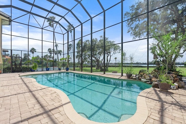 pool with a lanai and a patio