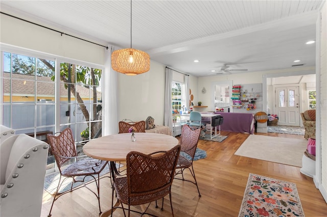 dining space with light wood-style floors, recessed lighting, visible vents, and ceiling fan