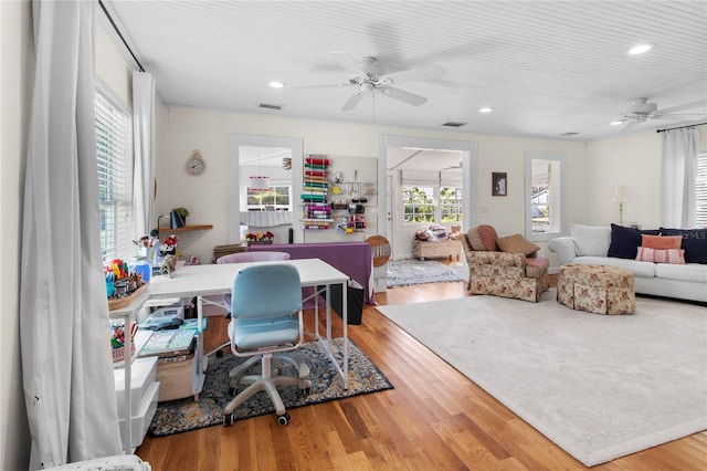 office area featuring a ceiling fan, recessed lighting, visible vents, and wood finished floors