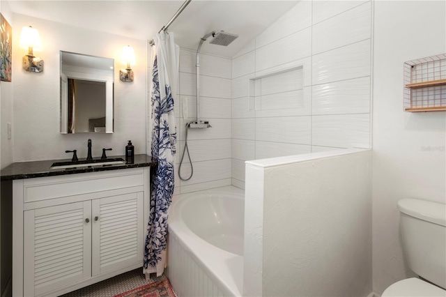 bathroom featuring vaulted ceiling, shower / bath combination with curtain, vanity, and toilet