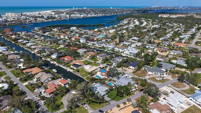 bird's eye view with a residential view and a water view