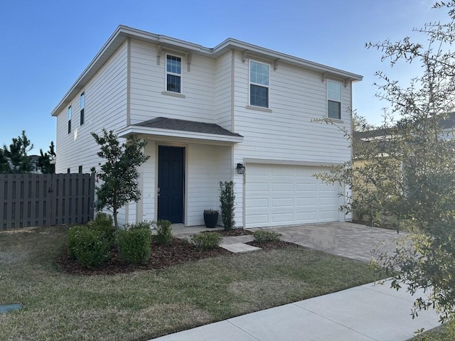 13633 NW 14th Pl, Newberry, FL 32669 - traditional-style house with a garage, fence, and driveway