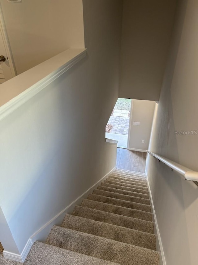 13633 NW 14th Pl, Newberry, FL 32669 - staircase with baseboards