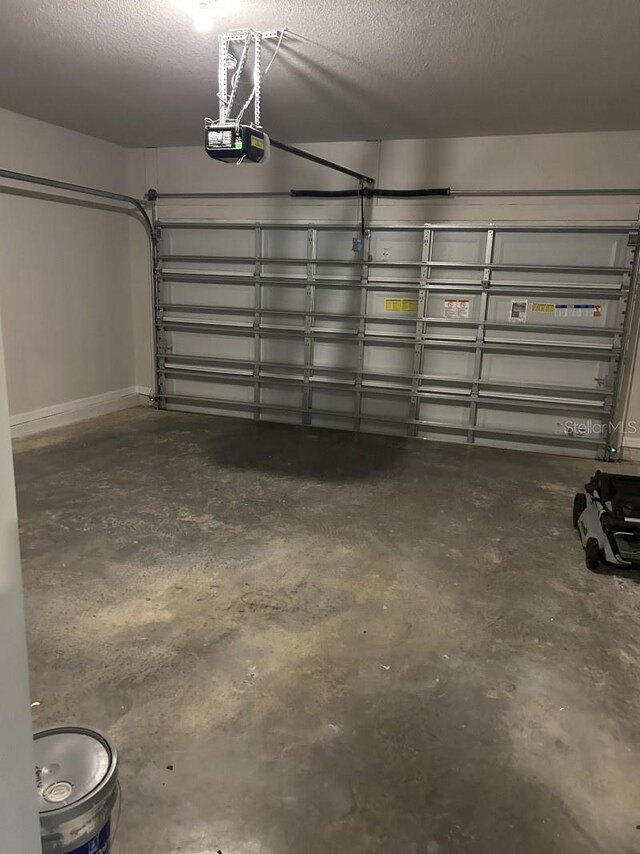 13633 NW 14th Pl, Newberry, FL 32669 - garage featuring a garage door opener