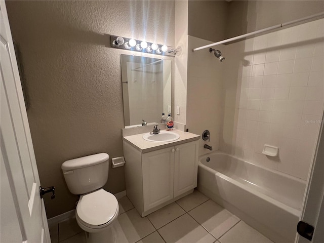 bathroom with shower / bath combination, a textured wall, toilet, tile patterned floors, and vanity