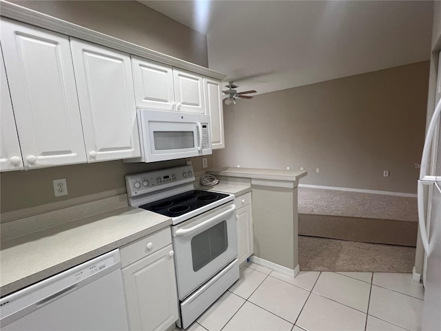 kitchen featuring white appliances, light tile patterned floors, ceiling fan, light countertops, and white cabinetry